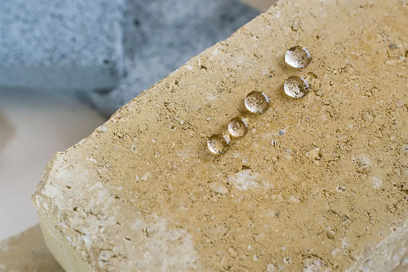 Water droplets sitting proud on treated stone