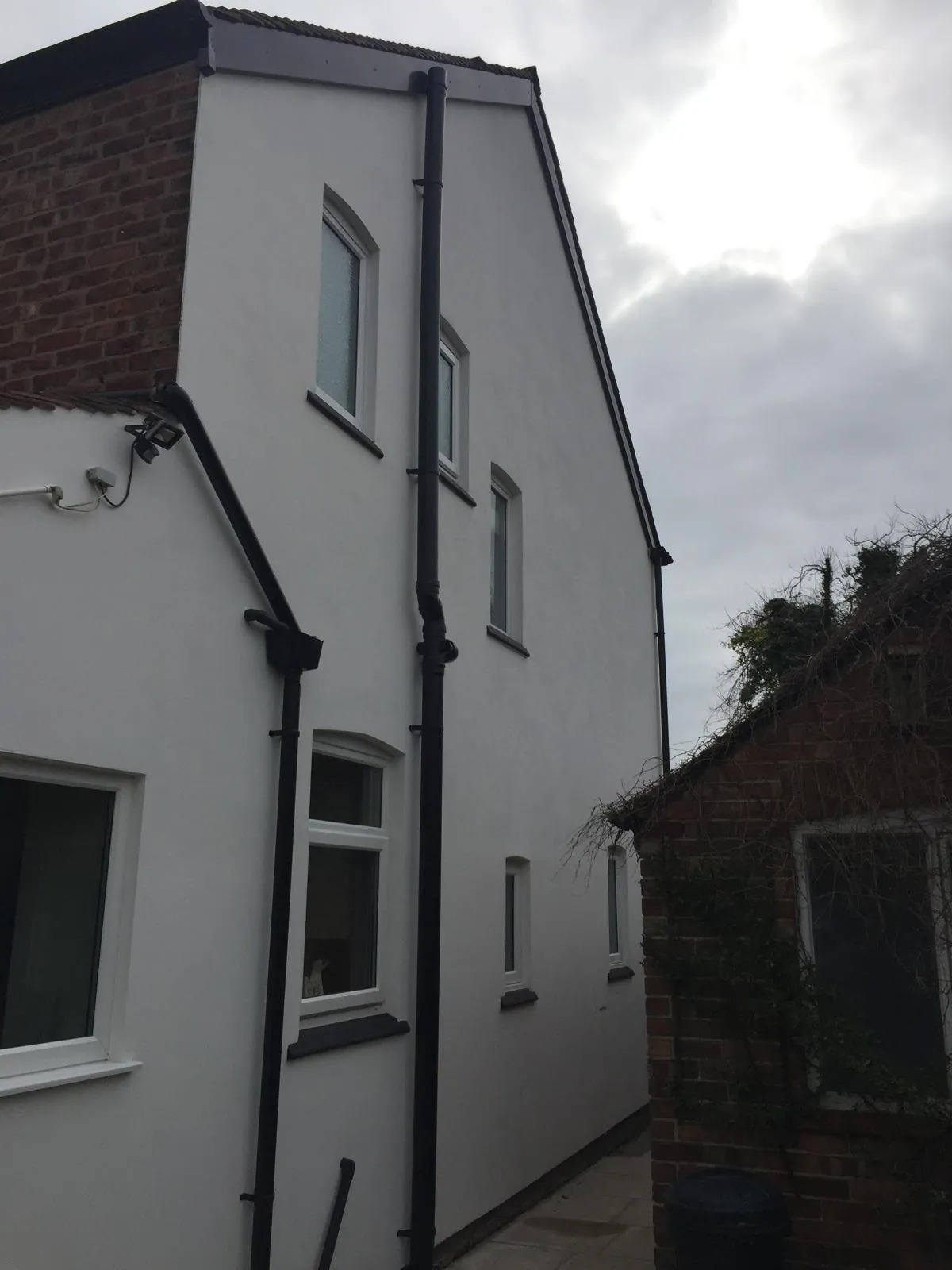 Rear elevation with fresh white render coating